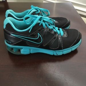 Women’s teal/black nike air running shoes